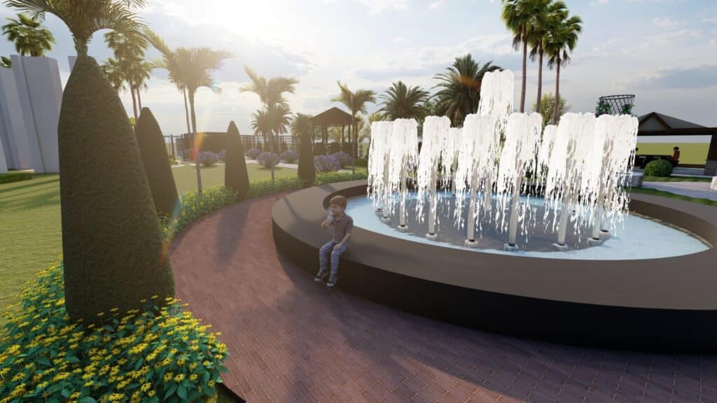 "Urban landscaping at Taj Commercial Hub Phool Nagar – walkways, shrubs, and curated outdoor space"