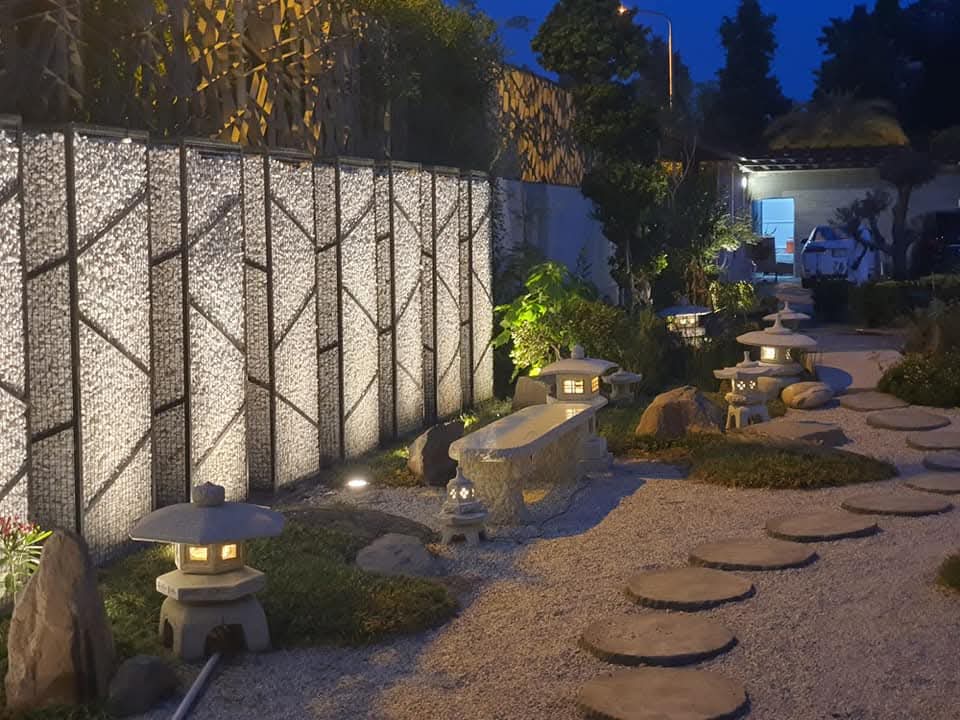 "Zen Garden residential landscape with minimalist stone and gravel elements – LandscapeCompany.pk"