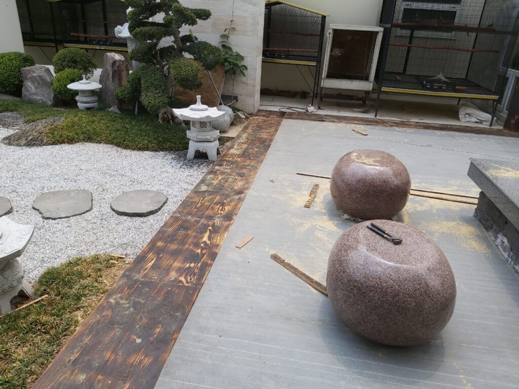 "Custom-designed Zen courtyard with symmetrical layout and water feature – Landscape execution"