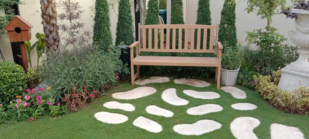 "Beautifully executed classical courtyard with pergola and topiary"