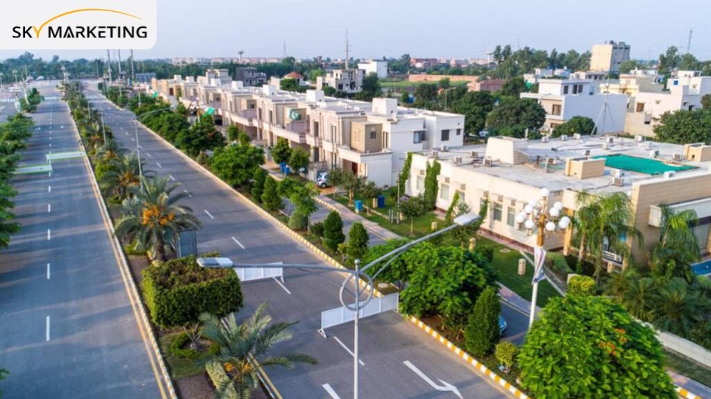 Executed landscape design at Dream Gardens Lahore with manicured lawns and structured planting beds